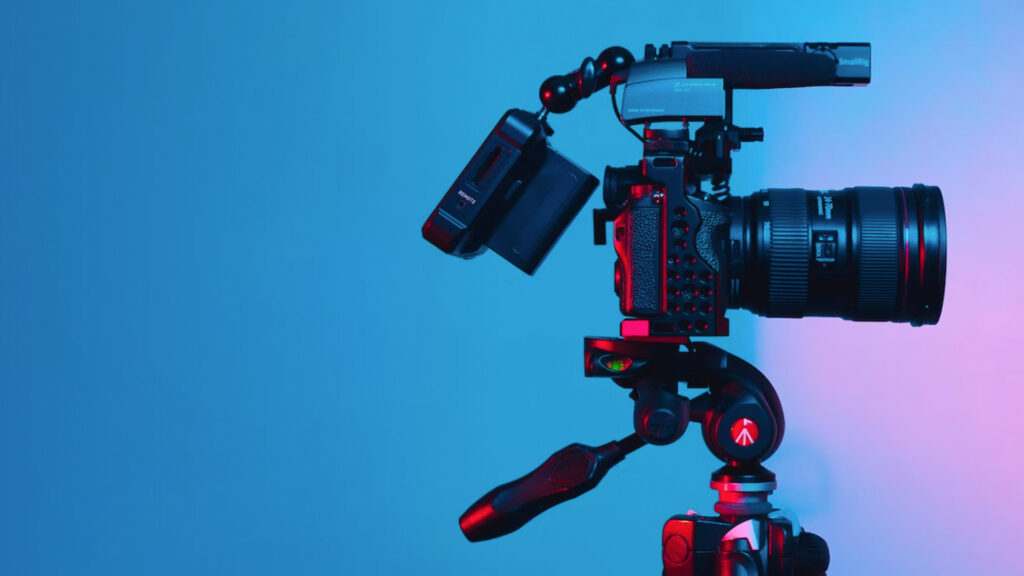 Blue and purple background, with a camera