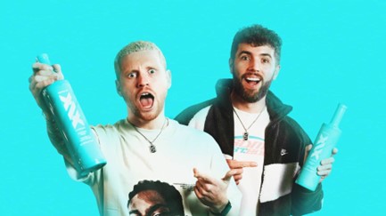 Two men with two bottles of vodka