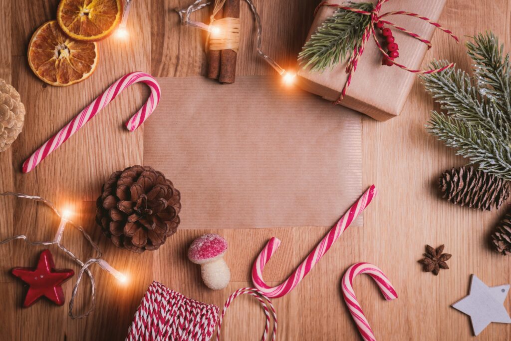Pine cones and candy canes on a table